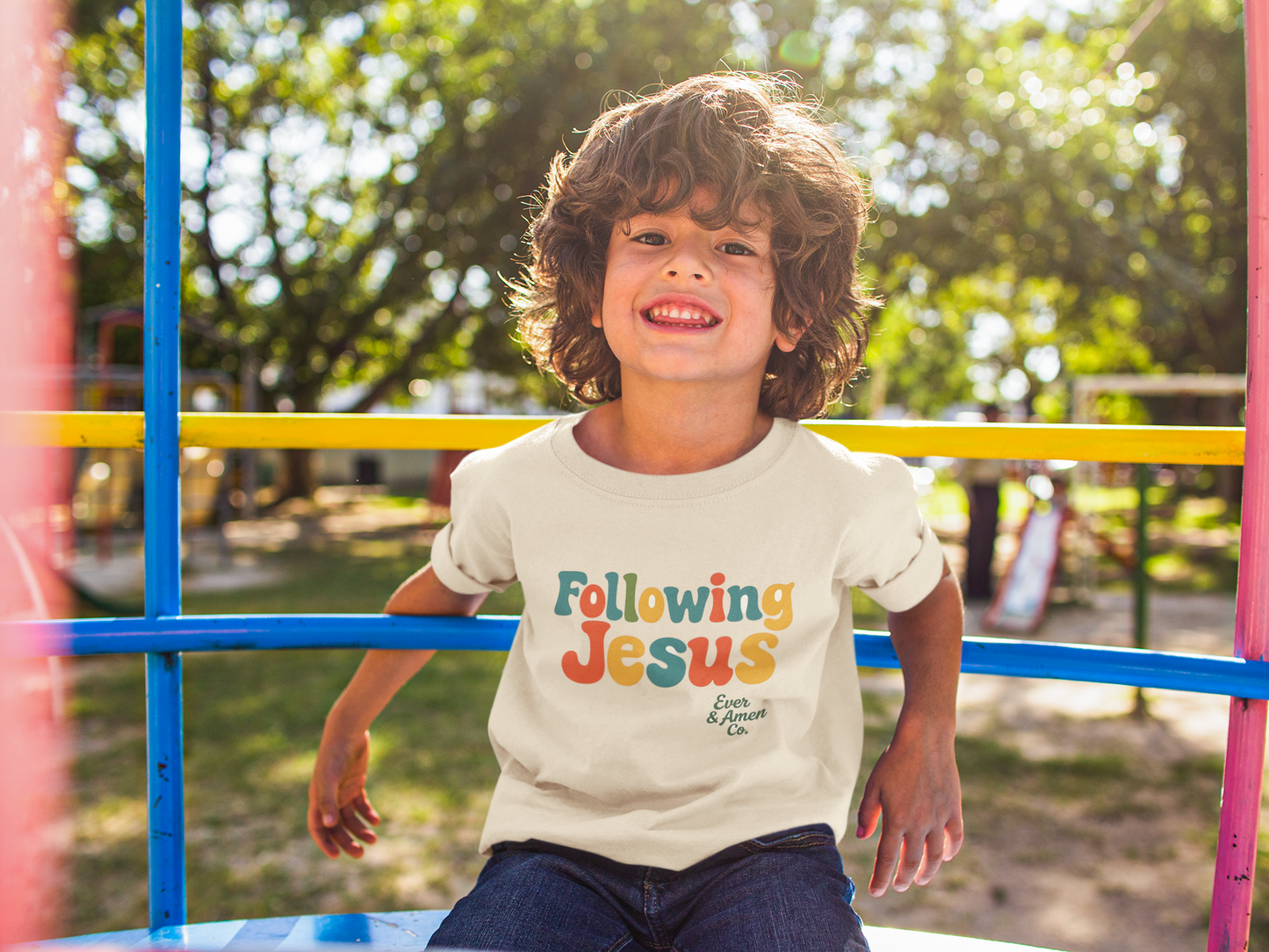 Faith-inspired childrenâs tee with âFollowing Jesusâ graphic. Soft, unisex Christian apparel for kids.