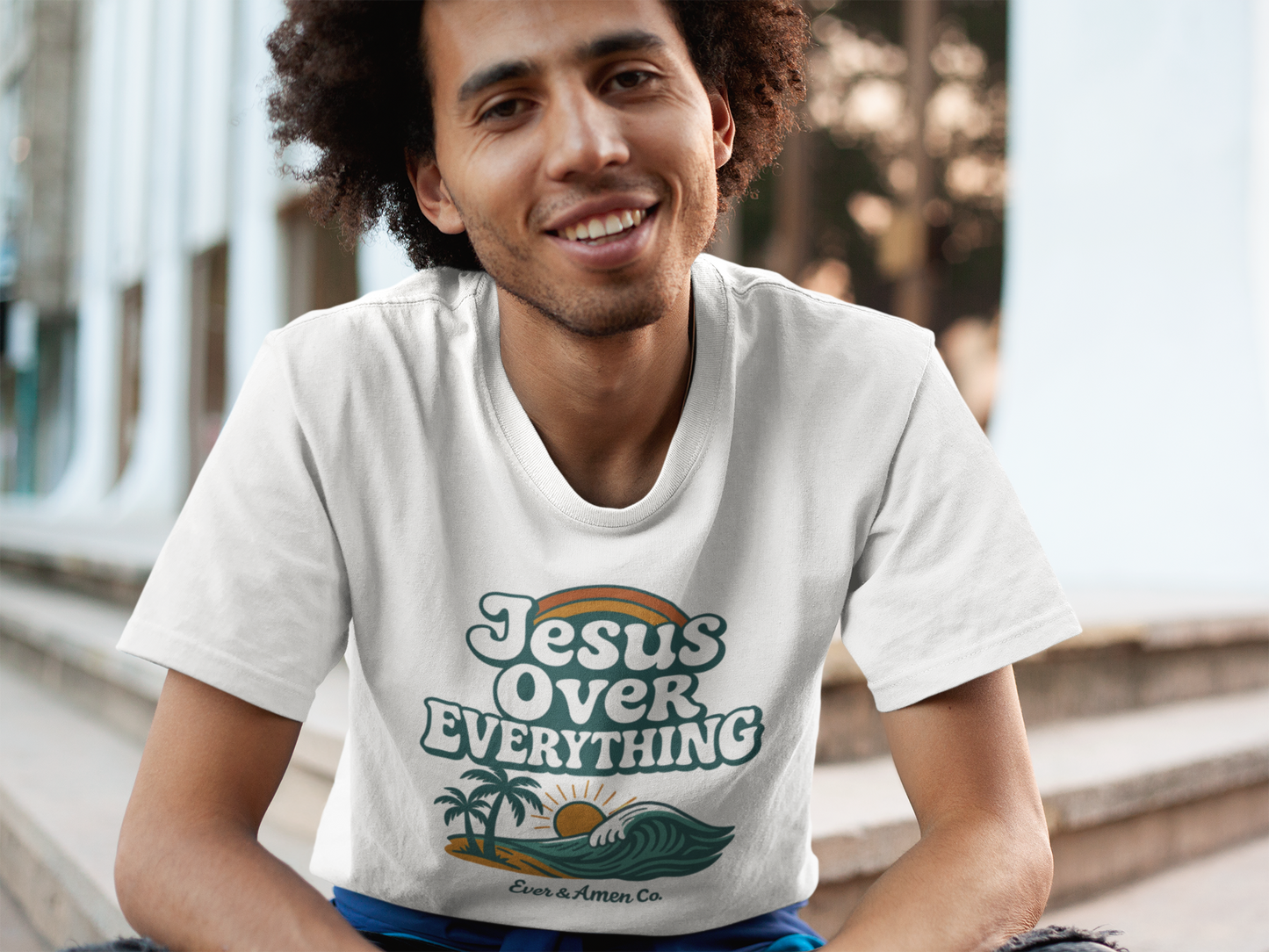 Faith-based graphic tee for men and women with “Jesus Over Everything” lettering