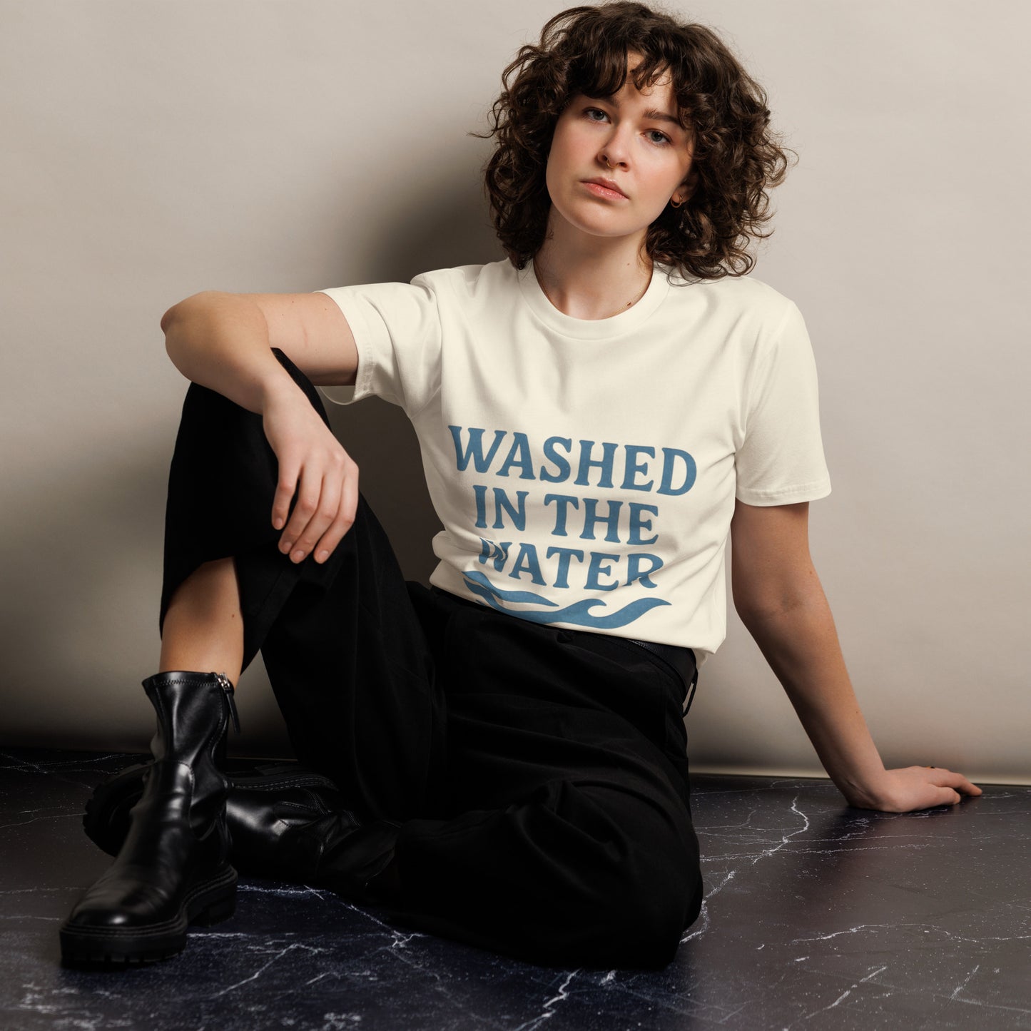 Unisex Christian graphic tee with the phrase “Washed in the Water.” Soft and durable faith-based shirt symbolizing baptism and new life in Christ. Perfect for church, baptisms, or everyday wear. Designed by Ever & Amen Co.