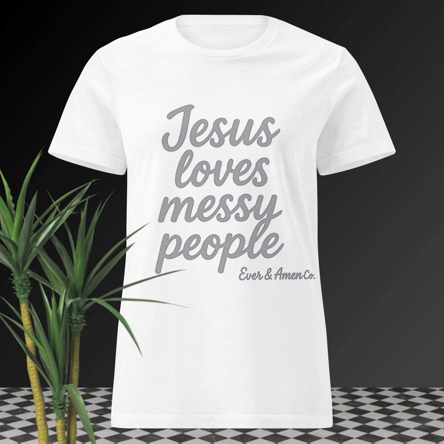 Women’s Christian graphic tee with the phrase “Jesus Loves Messy People.” Soft and stylish faith-based shirt celebrating God’s grace and unconditional love. Perfect for church, Bible study, or everyday wear. Designed by Ever & Amen Co.