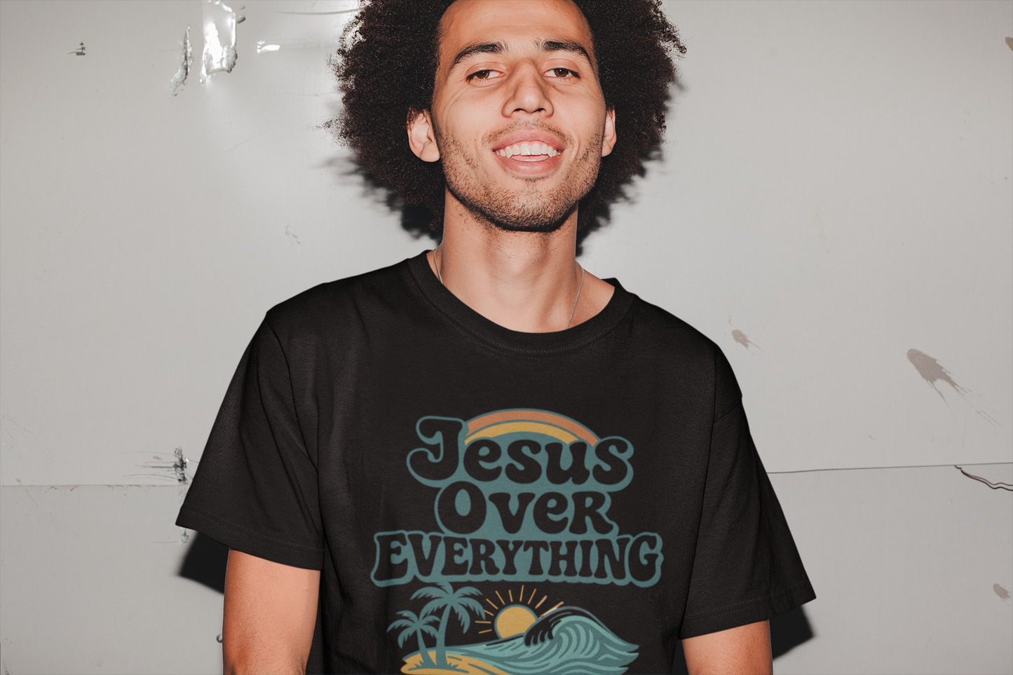 Unisex Christian t-shirt with “Jesus Over Everything” design. Faith-based apparel inspired by Colossians 1:17