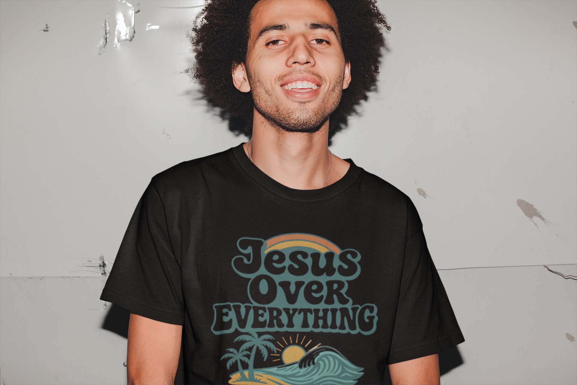 Unisex Christian t-shirt with “Jesus Over Everything” design. Faith-based apparel inspired by Colossians 1:17