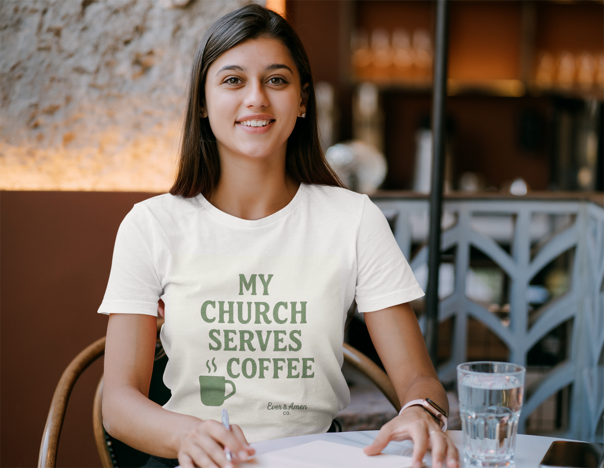 Women’s Christian graphic tee with the phrase “My Church Serves Coffee.” Fun, faith-based shirt perfect for Sunday service, casual wear, or fellowship. Designed by Ever & Amen Co. to blend humor, style, and faith.