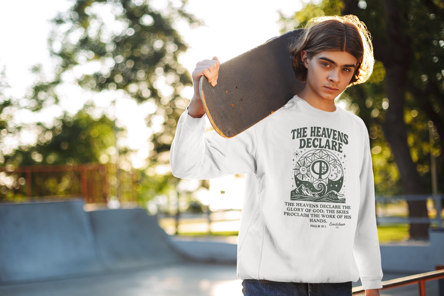 Unisex Christian crew neck sweatshirt with the phrase “The Heavens Declare,” inspired by Psalm 19:1 and the golden ratio. Soft, faith-based sweatshirt perfect for church, Bible study, or everyday wear. Designed by Ever & Amen Co.