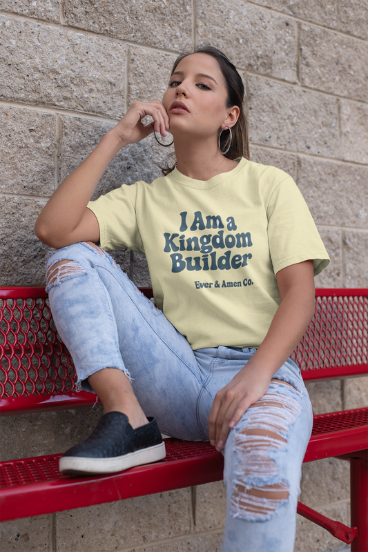 Women’s Christian graphic tee with the phrase “I Am a Kingdom Builder.” Bold and empowering faith-based shirt designed to inspire confidence and purpose. Perfect for church, ministry, or everyday wear. Created by Ever & Amen Co.