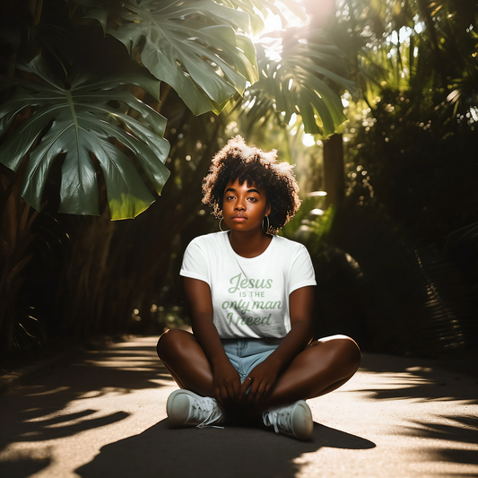 Women’s Christian graphic tee with the phrase “Jesus Is the Only Man I Need.” Stylish and faith-filled shirt designed for church, Bible study, or everyday wear. A modern statement piece from Ever & Amen Co.