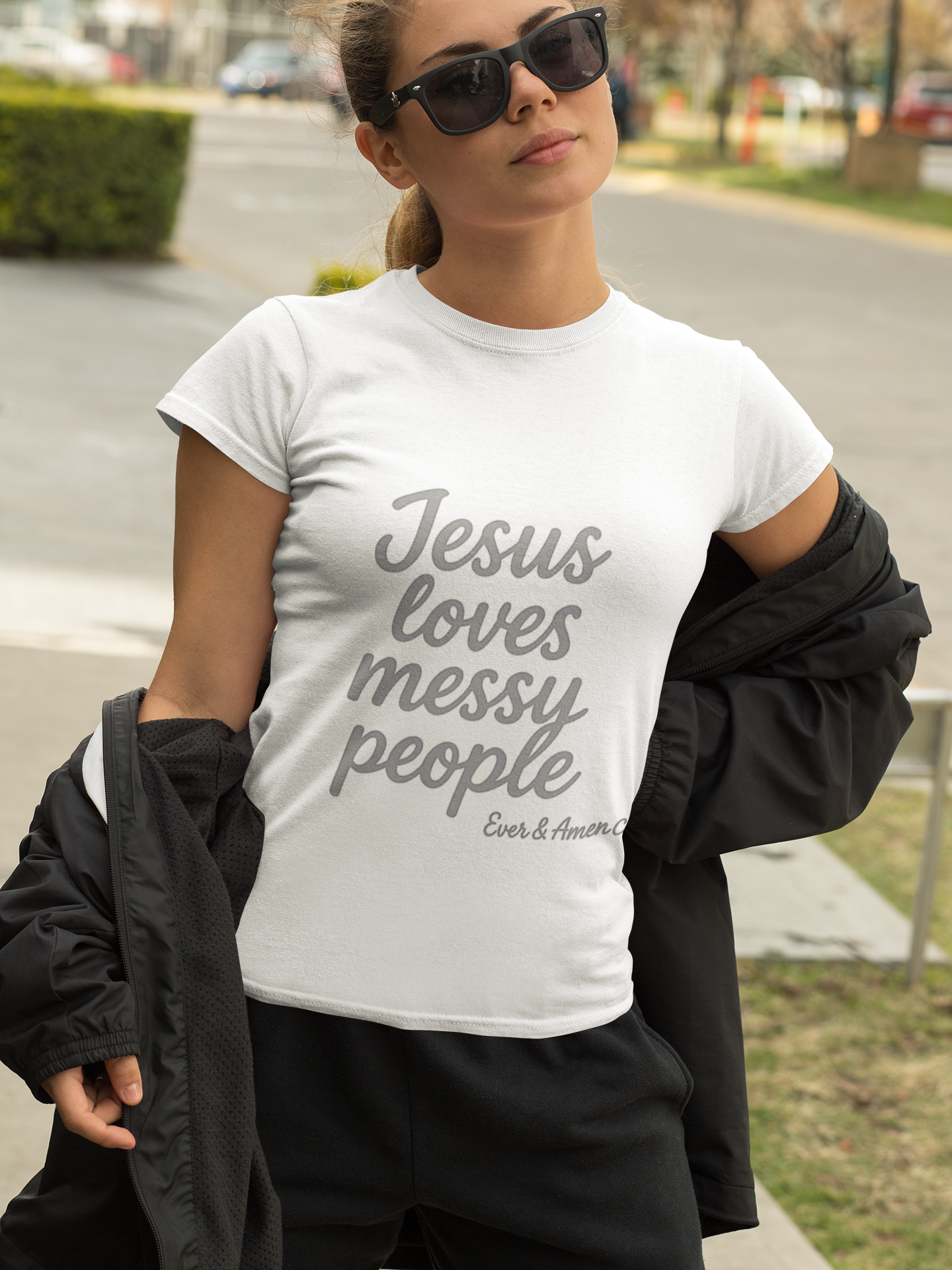 Women’s Christian graphic tee with the phrase “Jesus Loves Messy People.” Soft and stylish faith-based shirt celebrating God’s grace and unconditional love. Perfect for church, Bible study, or everyday wear. Designed by Ever & Amen Co.