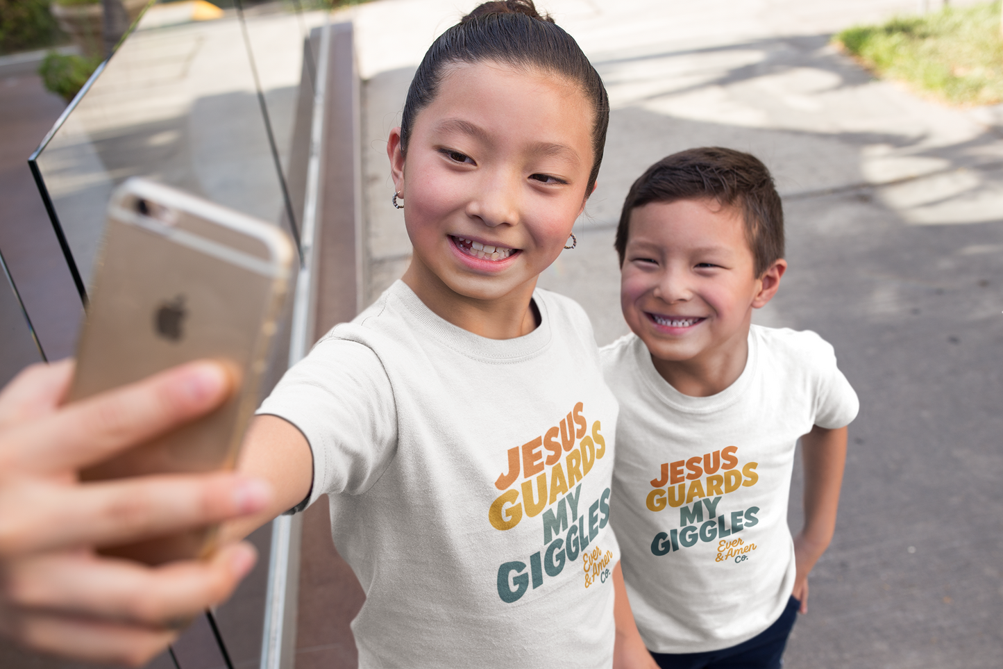 Children’s Christian graphic tee with the phrase “Jesus Guards My Giggles.” Fun and uplifting faith-based shirt reminding kids of God’s love and protection. Perfect for church, school, or everyday play. Created by Ever & Amen Co.