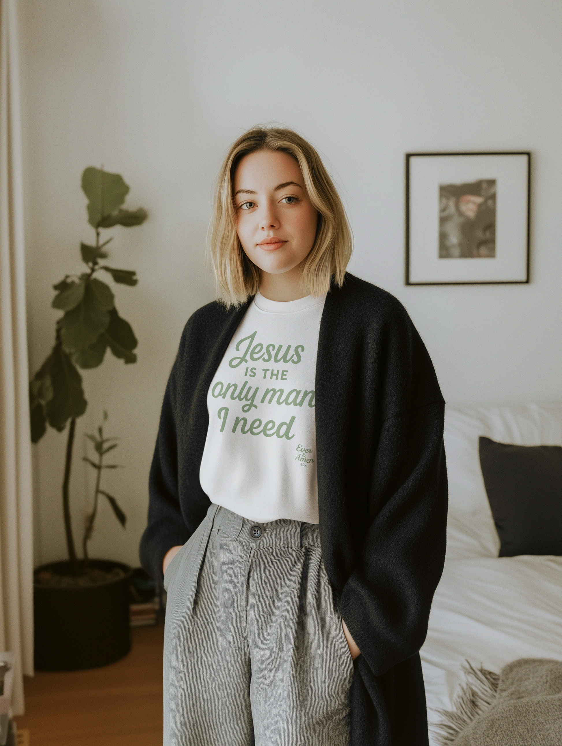 Women’s Christian graphic tee with the phrase “Jesus Is the Only Man I Need.” Stylish and faith-filled shirt designed for church, Bible study, or everyday wear. A modern statement piece from Ever & Amen Co.