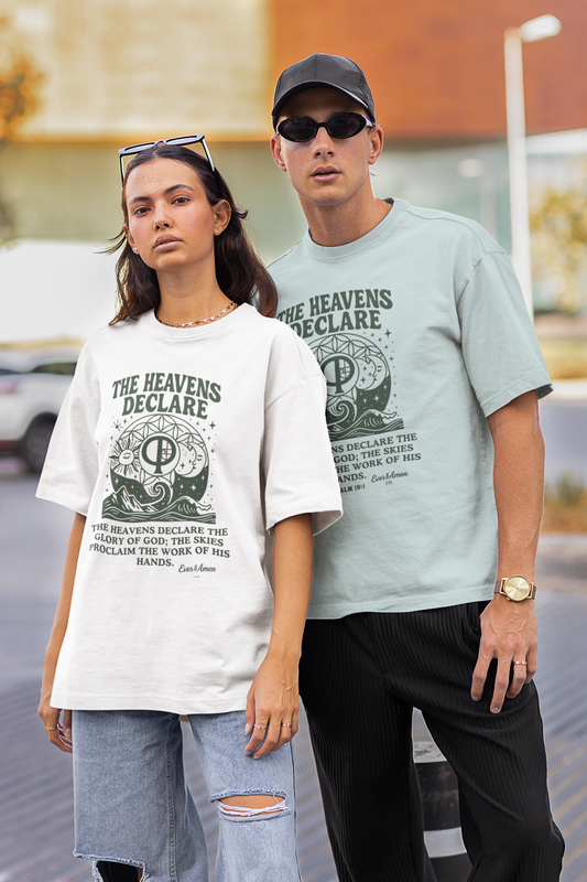 Oversized unisex Christian graphic tee with the phrase “The Heavens Declare,” inspired by Psalm 19:1 and the golden ratio. Soft, faith-based shirt perfect for modern Christian streetwear, church, or everyday wear. Designed by Ever & Amen Co.