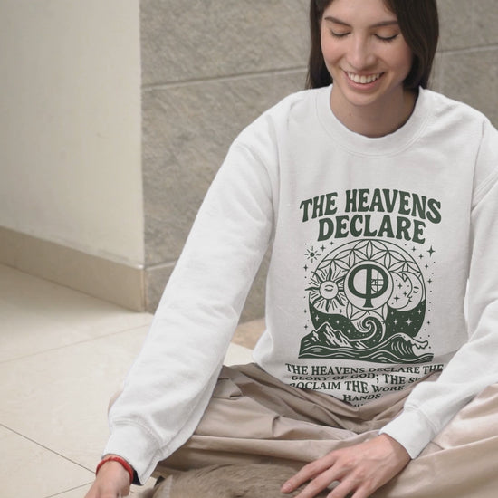Unisex Christian crew neck sweatshirt with the phrase “The Heavens Declare,” inspired by Psalm 19:1 and the golden ratio. Soft, faith-based sweatshirt perfect for church, Bible study, or everyday wear. Designed by Ever & Amen Co.