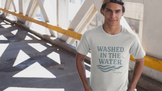 Unisex Christian tee with “Washed in the Water” design, symbolizing baptism and new life in Christ. Faith-based shirt by Ever & Amen Co.