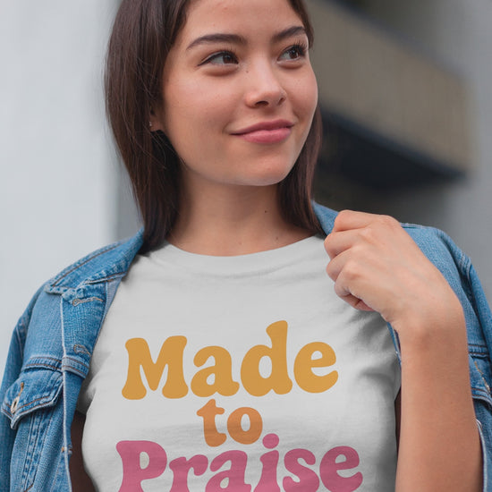 Women’s Bible verse t-shirt with “Made to Praise” lettering. Soft, faith-based apparel.