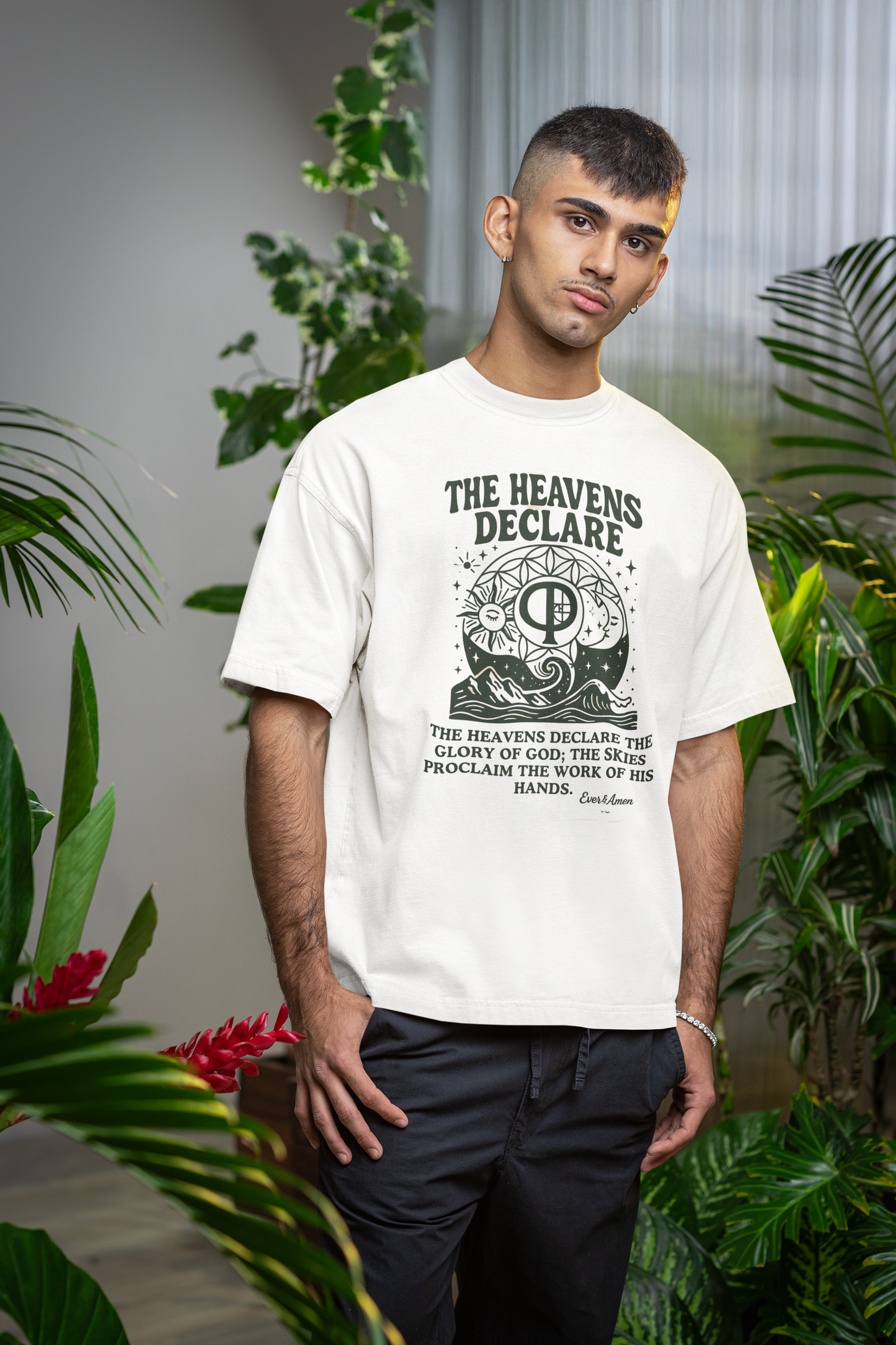 Oversized unisex Christian graphic tee with the phrase “The Heavens Declare,” inspired by Psalm 19:1 and the golden ratio. Soft, faith-based shirt perfect for modern Christian streetwear, church, or everyday wear. Designed by Ever & Amen Co.