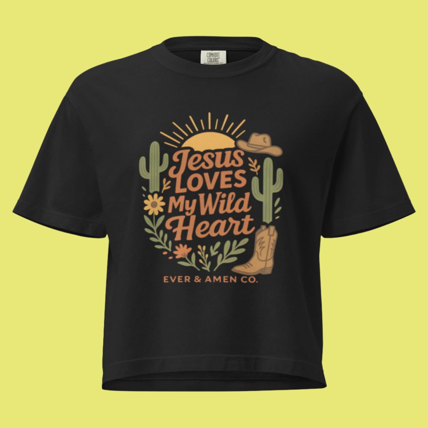 Ladies’ Christian graphic tee with the phrase “Jesus Loves My Wild Heart.” Soft, stylish, and faith-inspired shirt perfect for church, Bible study, or casual wear. Designed by Ever & Amen Co. to celebrate God’s love and individuality.