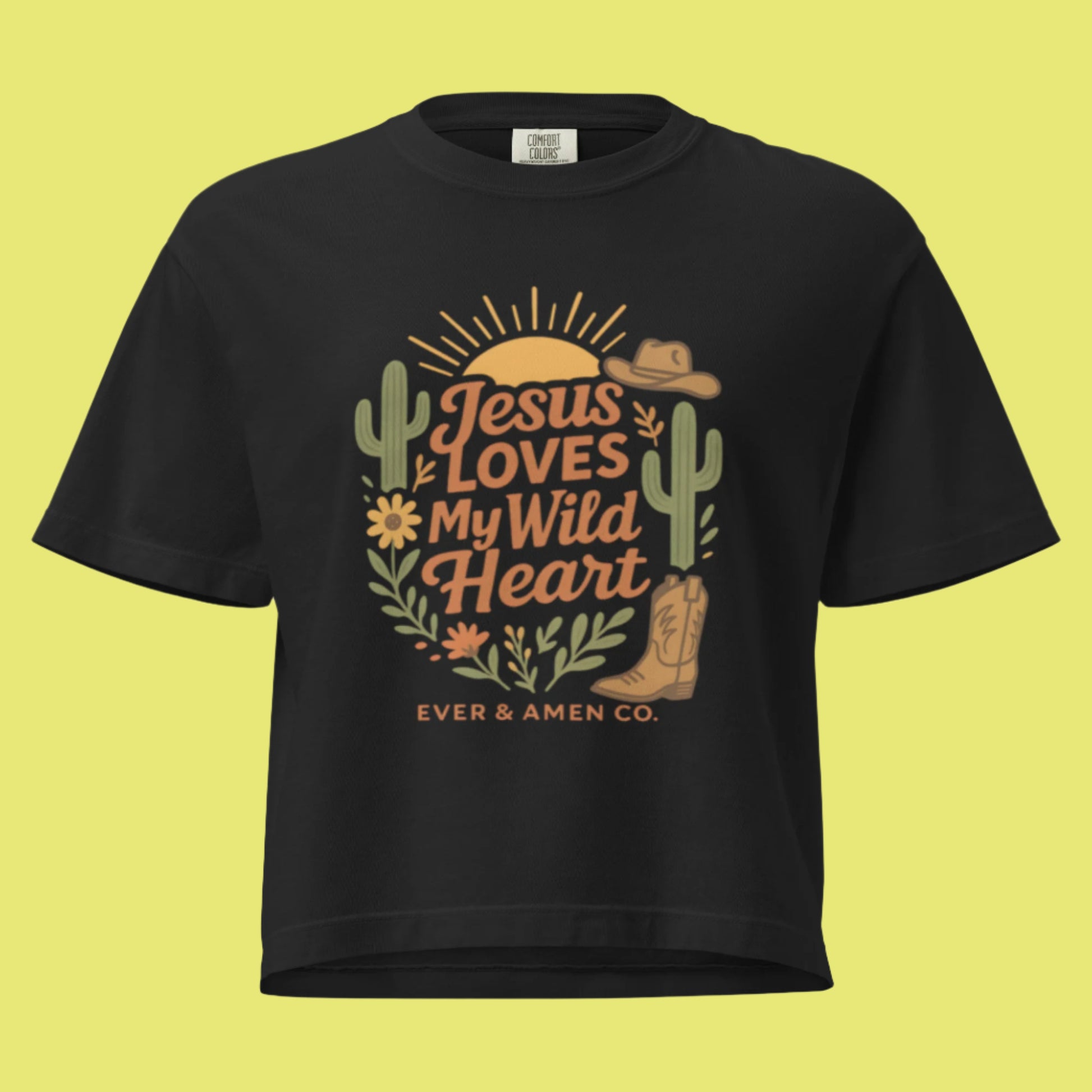 Ladies’ Christian graphic tee with the phrase “Jesus Loves My Wild Heart.” Soft, stylish, and faith-inspired shirt perfect for church, Bible study, or casual wear. Designed by Ever & Amen Co. to celebrate God’s love and individuality.